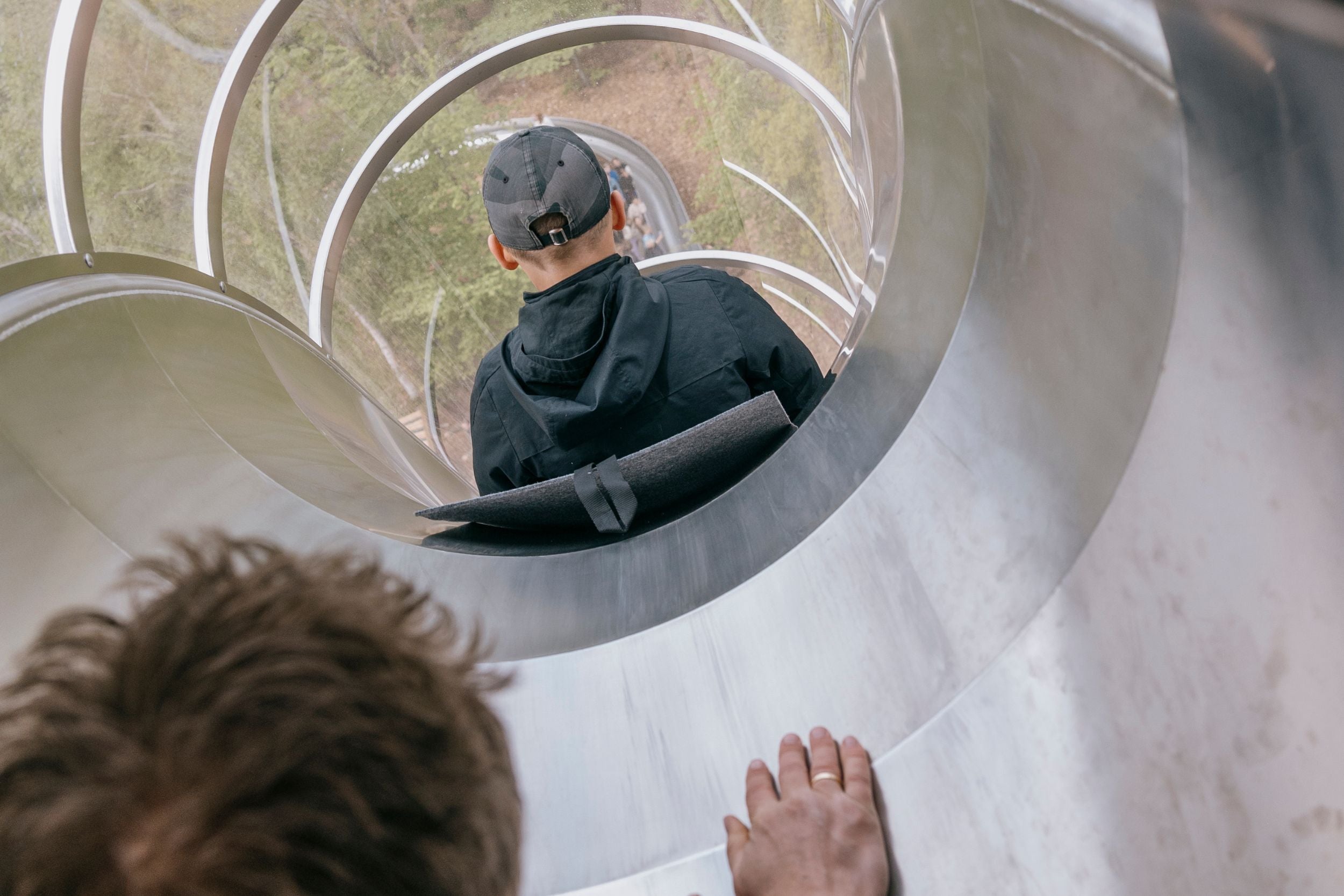 A person going down the LIGHTNING in WOW PARK.