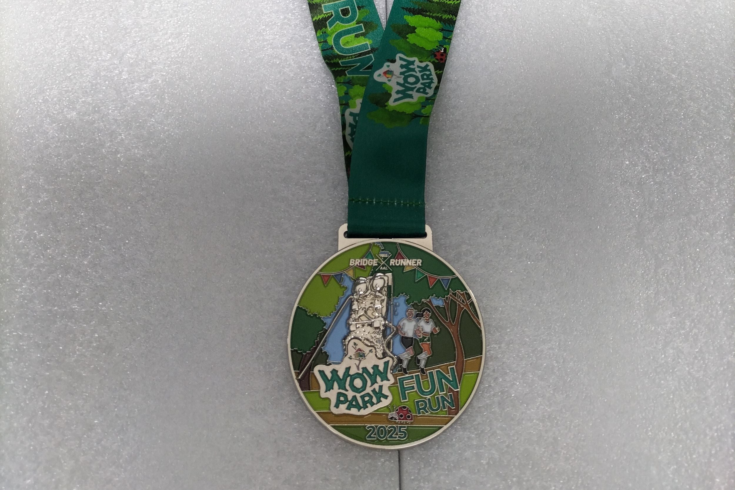 Flot medalje, som man fik, når man havde gennemført WOW PARK Fun Run 2025.