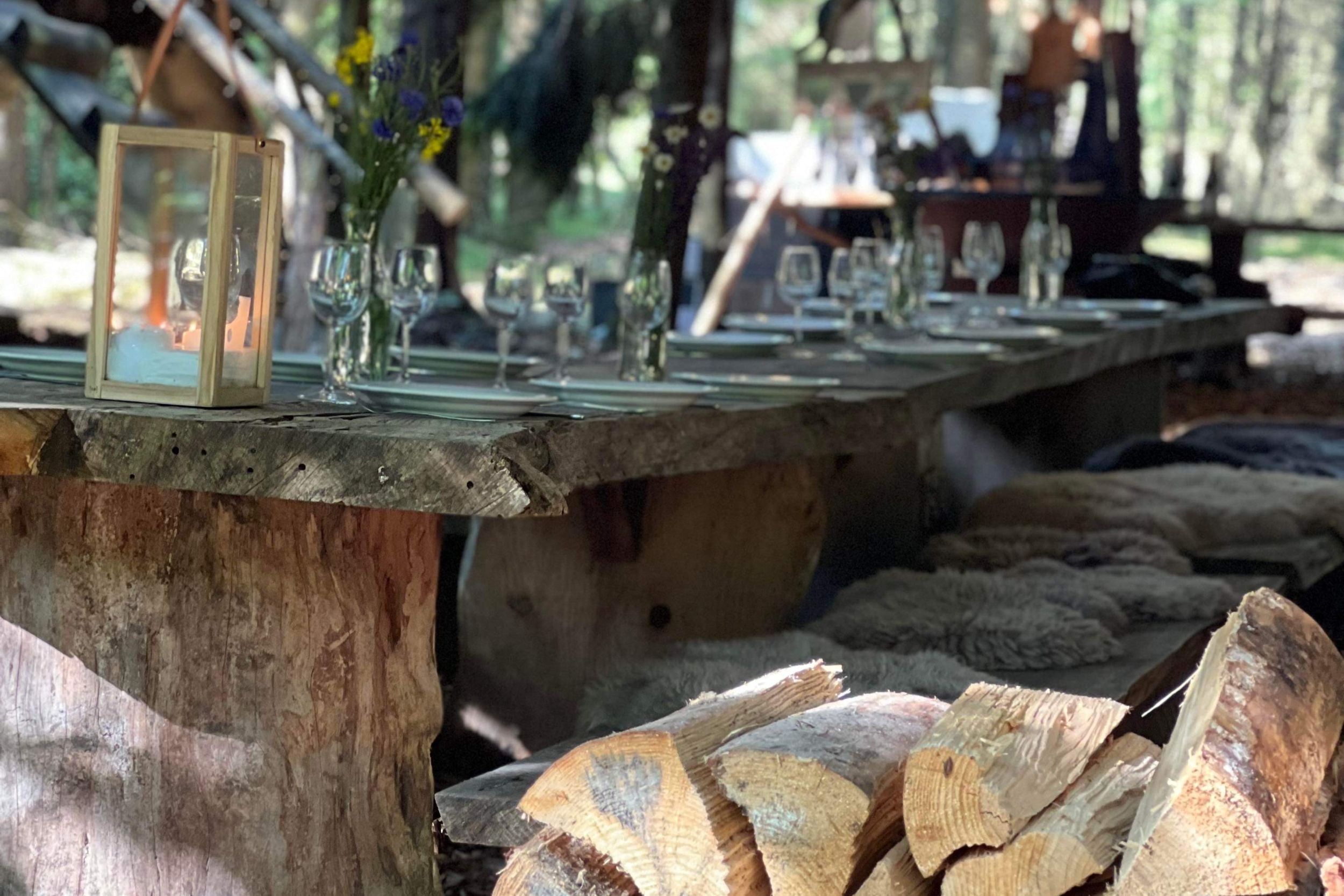 Beautifully set long table in WOW PARK's camp.