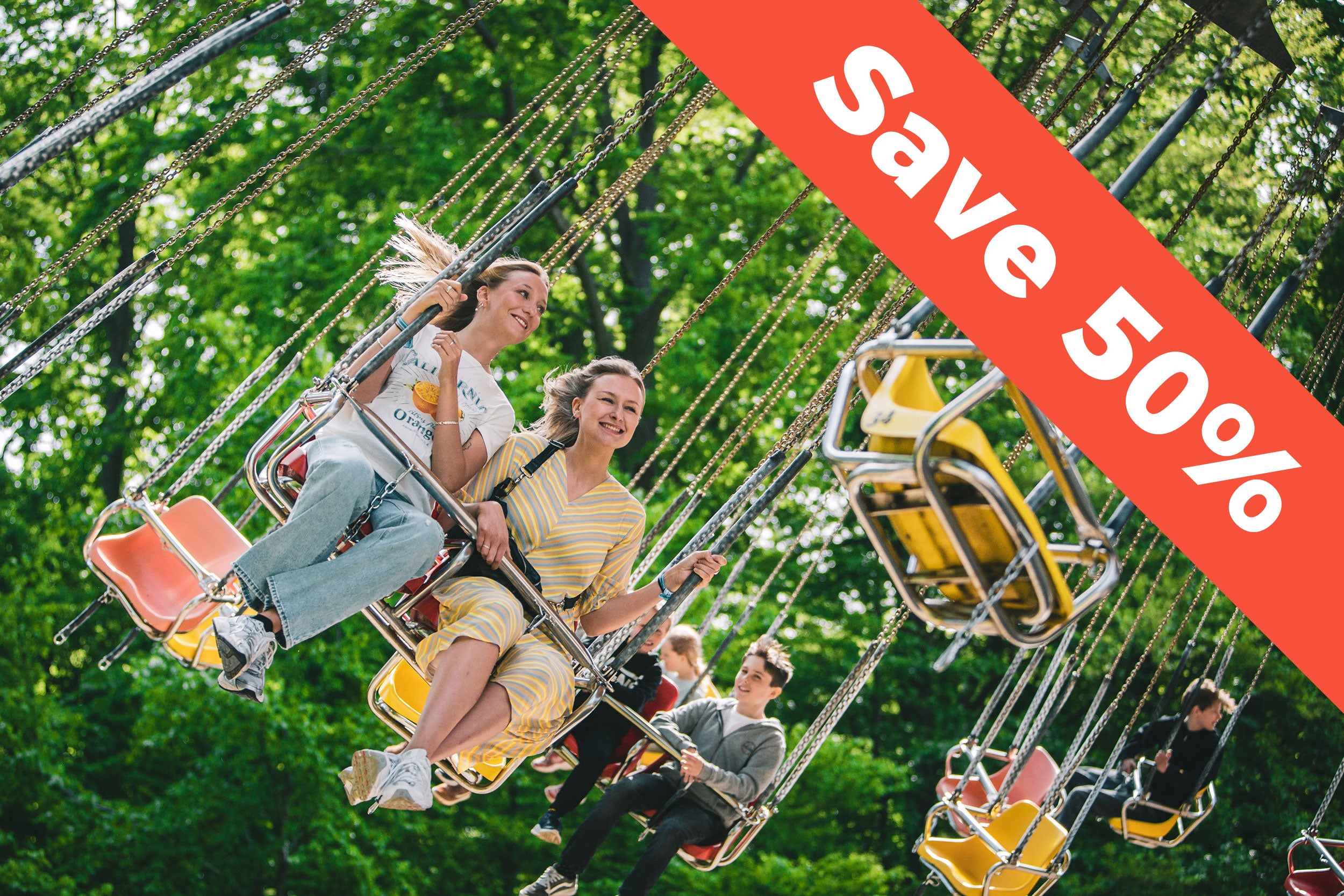 Guests at Tivoli Friheden are having fun on a ride.