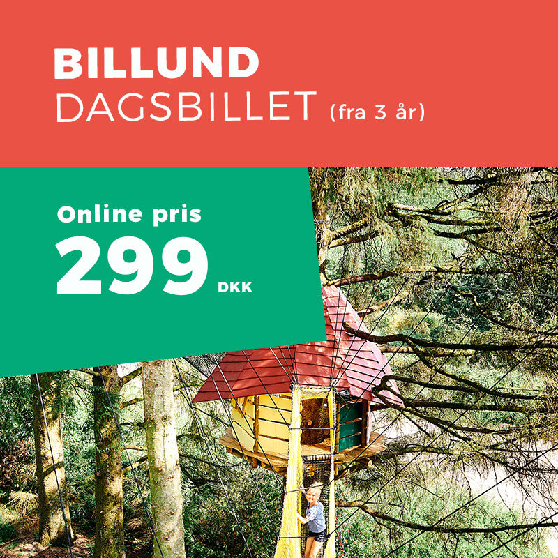 En glad pige er på vej i en netgangbro højt oppe i træerne i WOW PARK.